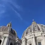 Renaissance domes under a clear blue sky